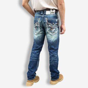 Model wearing Rock Revival Western Cowboy Straight-Leg Jeans with boots and vintage fade wash